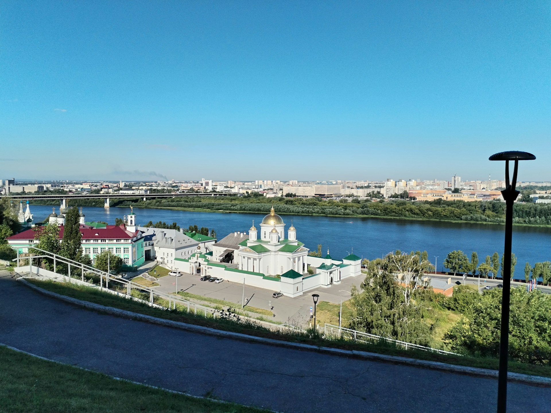 A view of a river and a city from a hill
