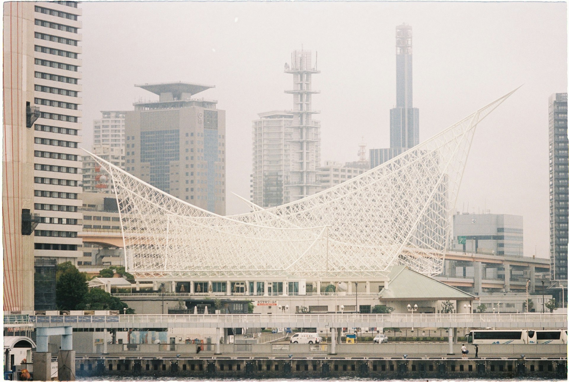 a large white structure in the middle of a body of water