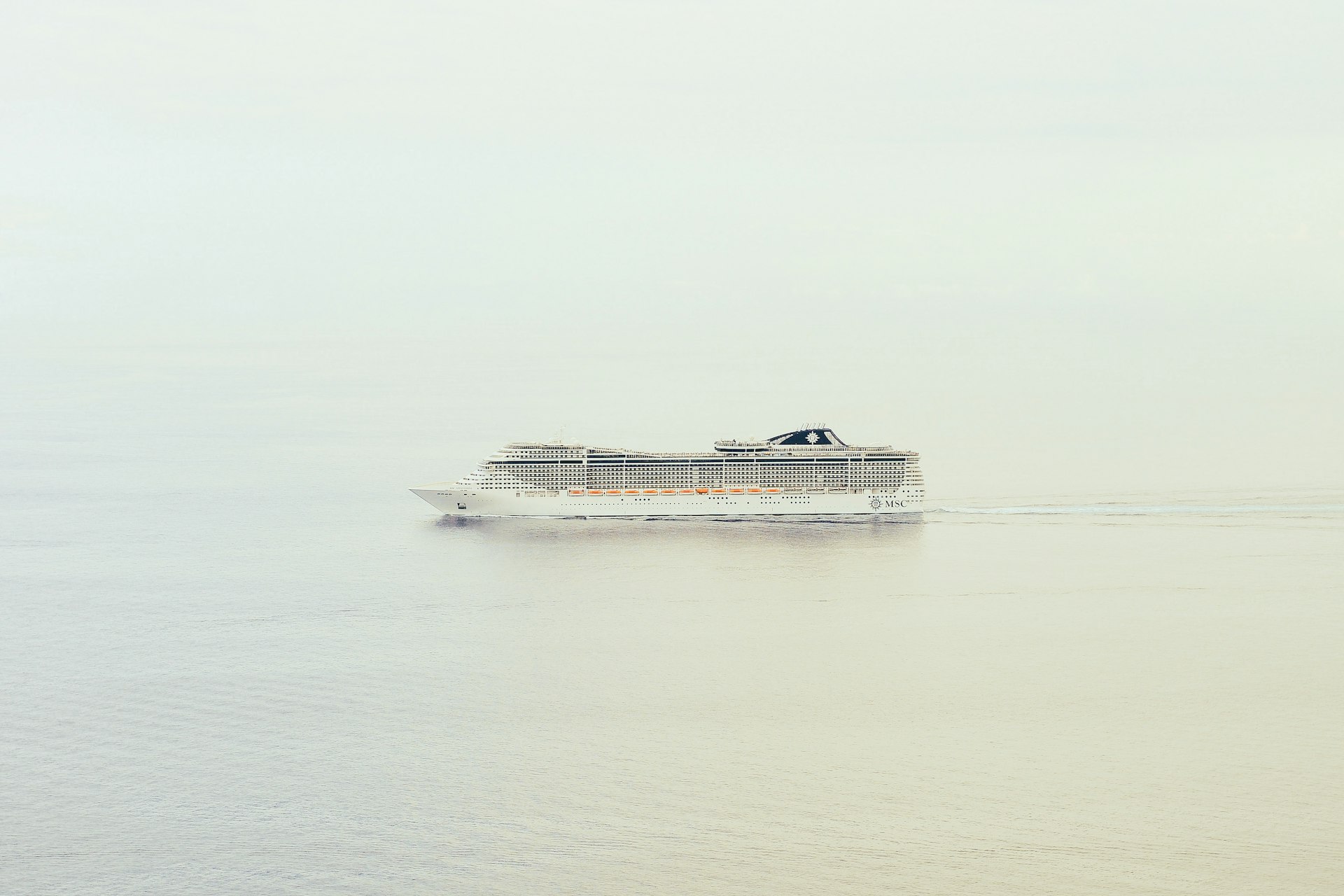 cruise ship on body of water
