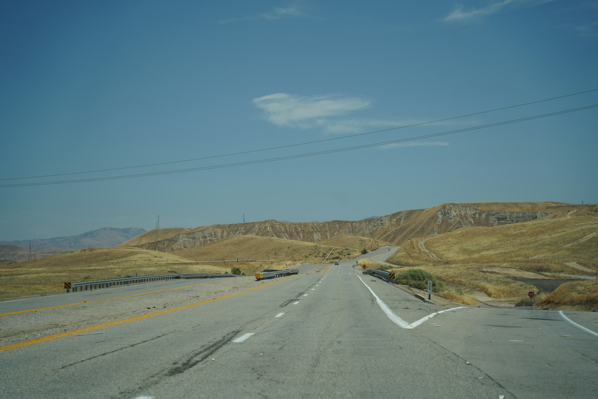 an empty road in the middle of nowhere
