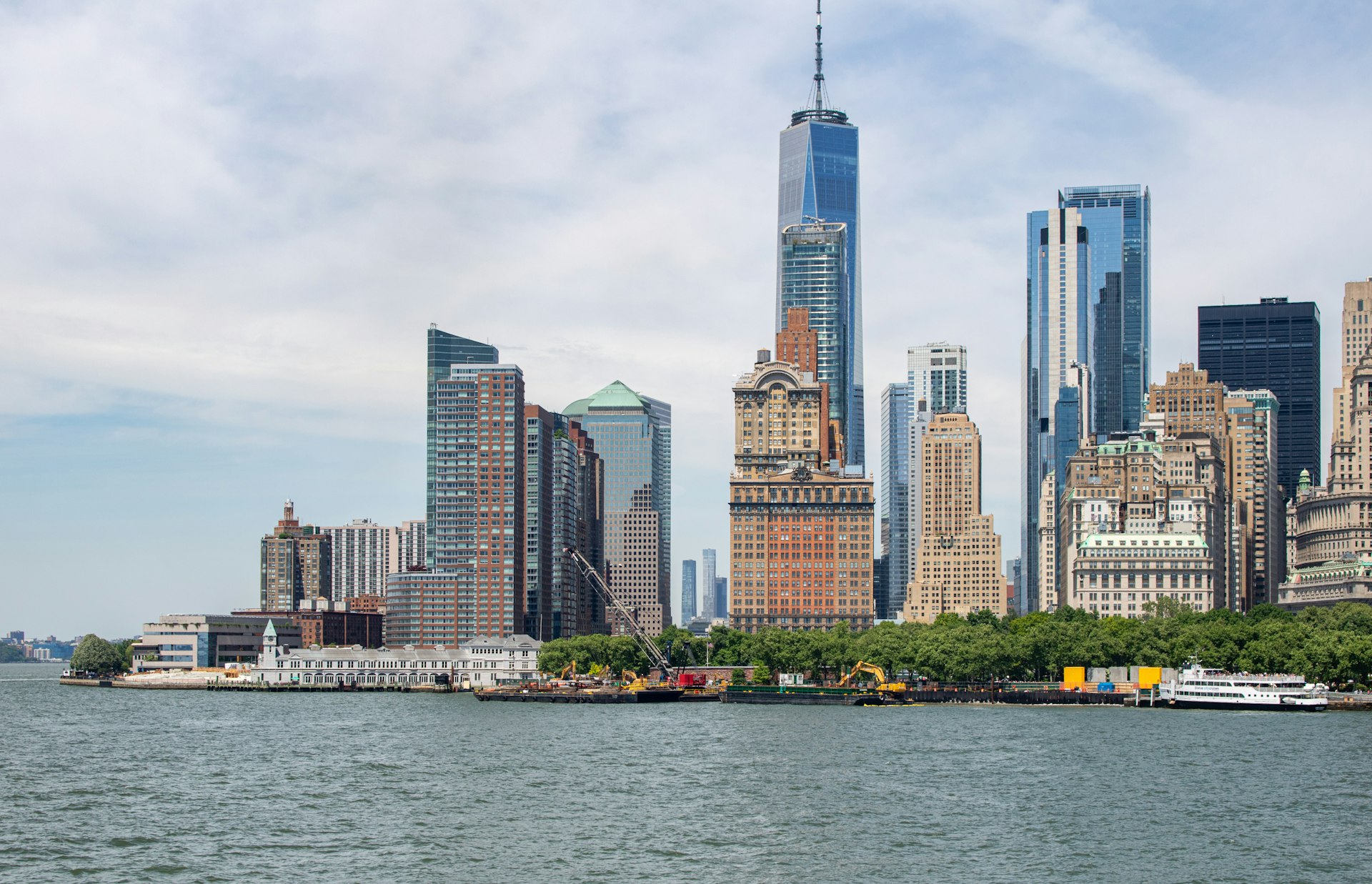 A large body of water with a city in the background