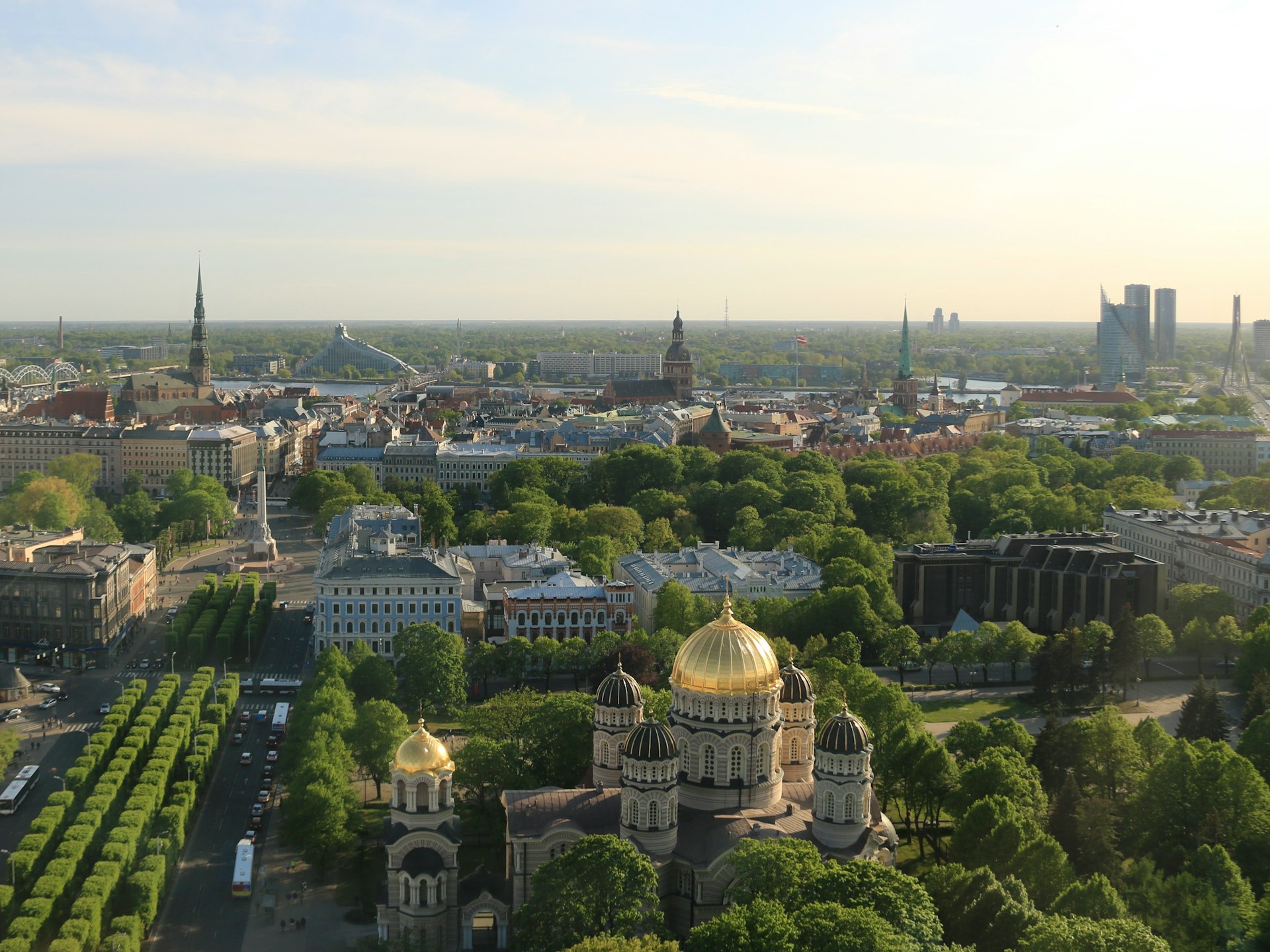 an aerial view of a city with trees and buildings