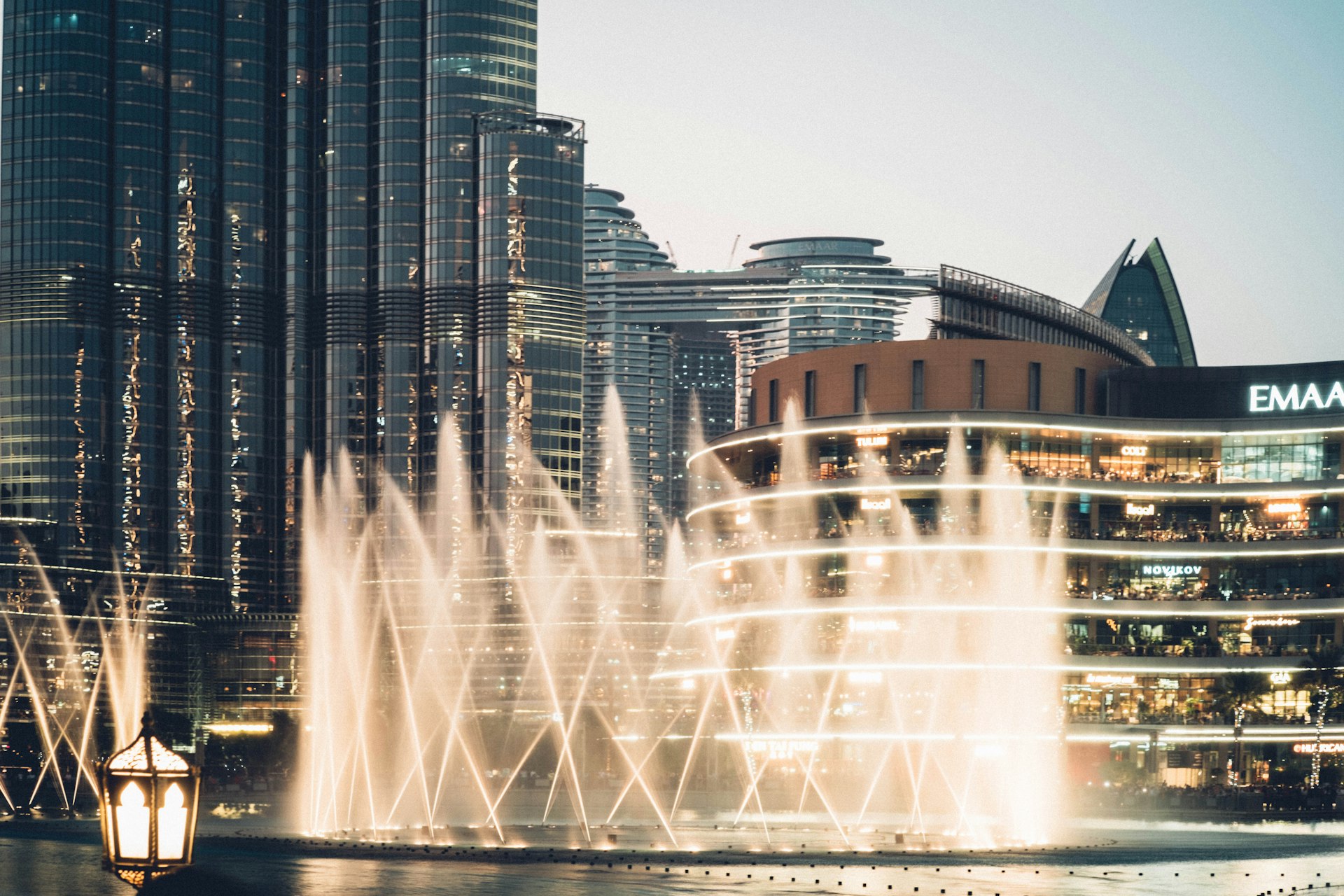 a fountain in front of a building