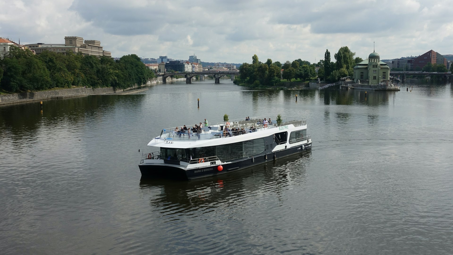 white and black boat on water during daytime