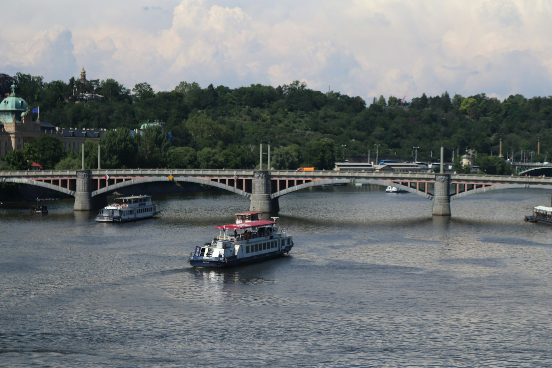 white and red boat on river during daytime