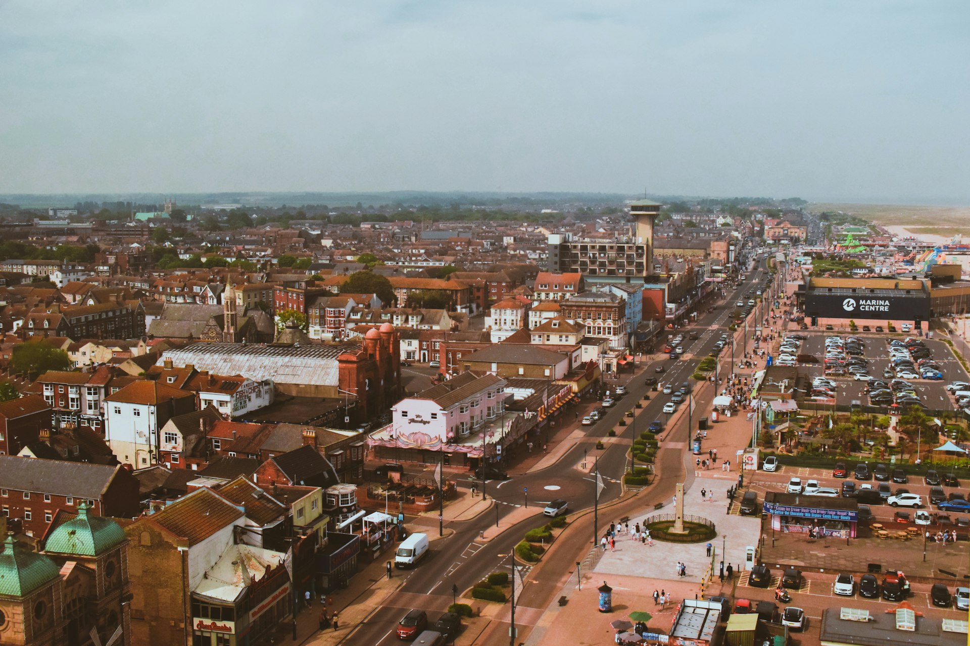 an aerial view of a city with lots of tall buildings