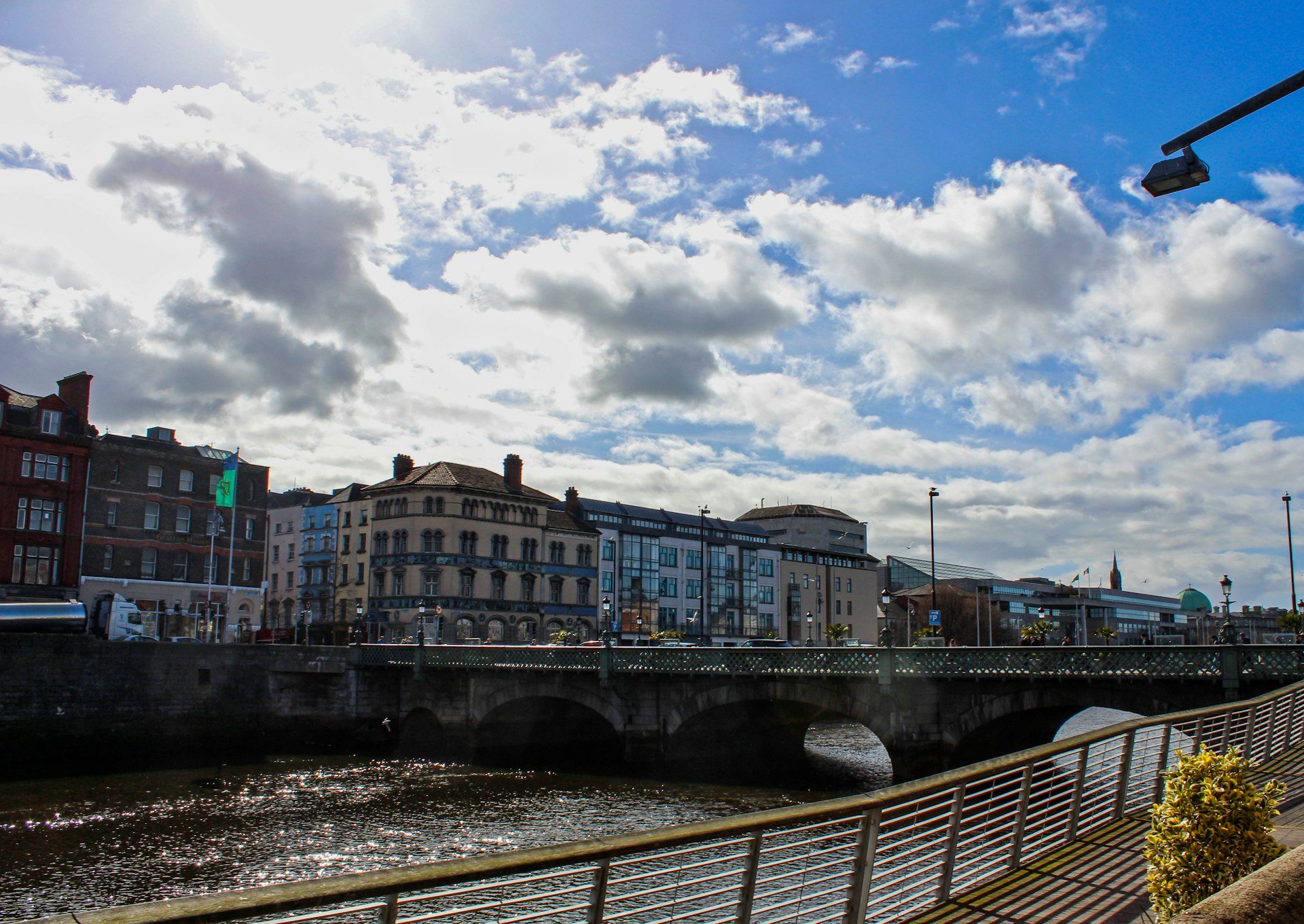 a bridge over a river in a city