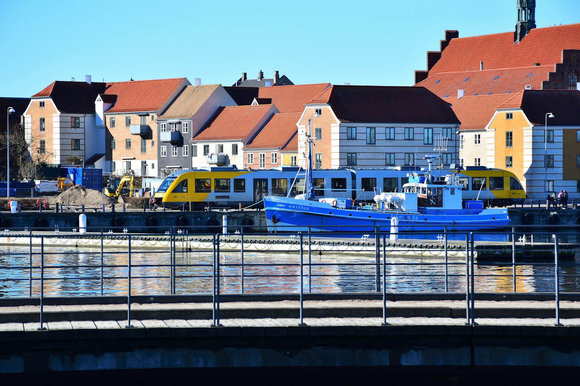 a group of boats that are sitting in the water