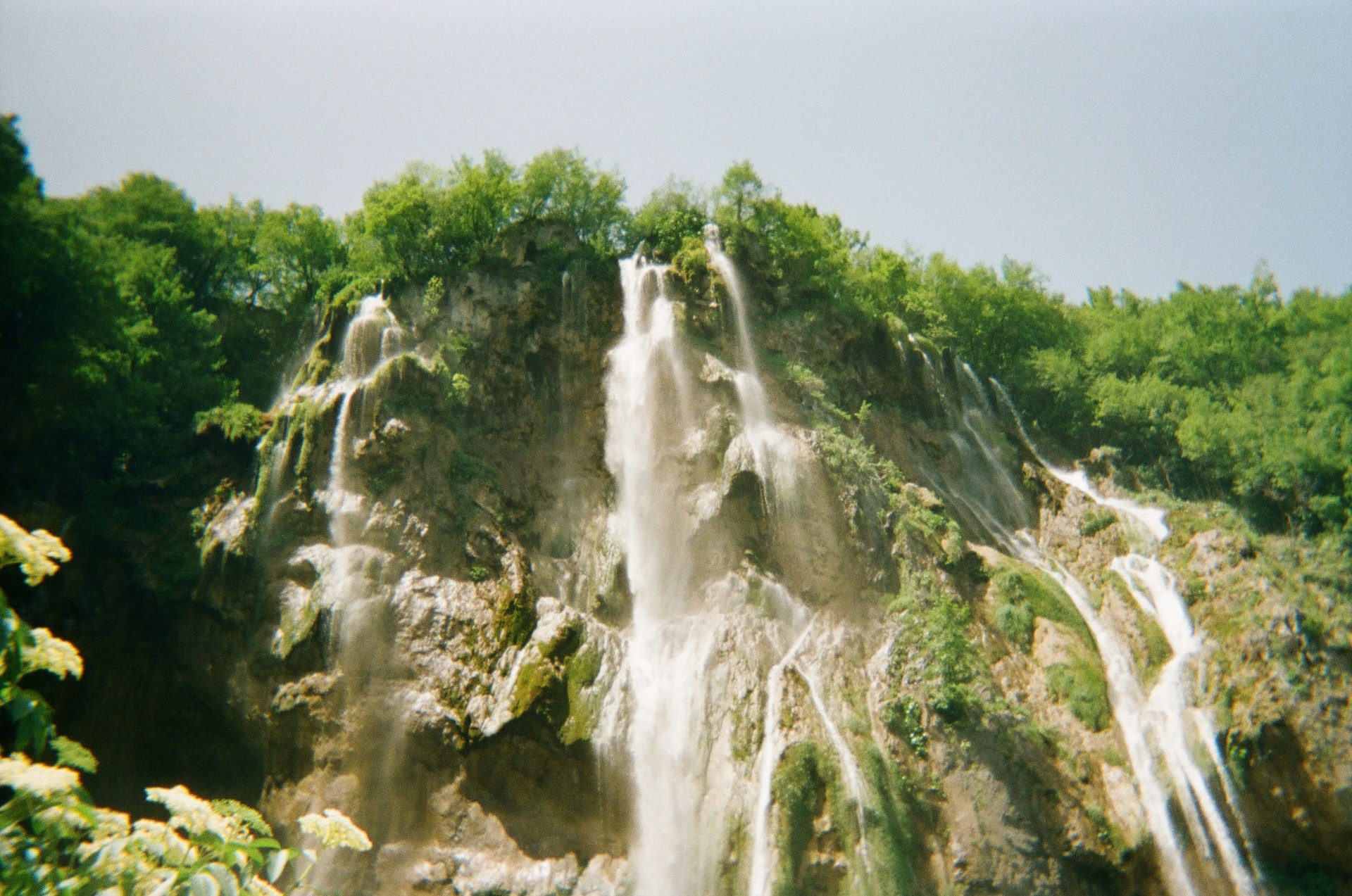 a waterfall in a forest