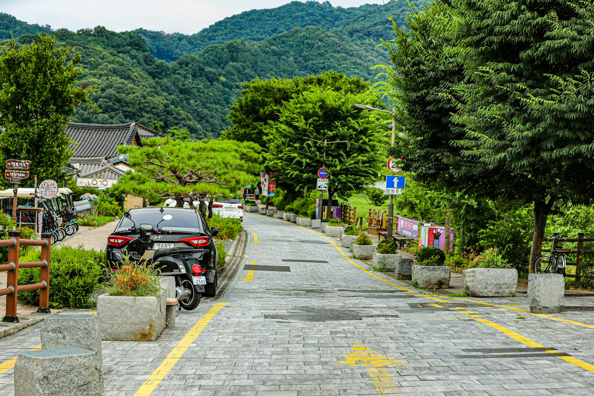 a motorcycle parked on the side of a road
