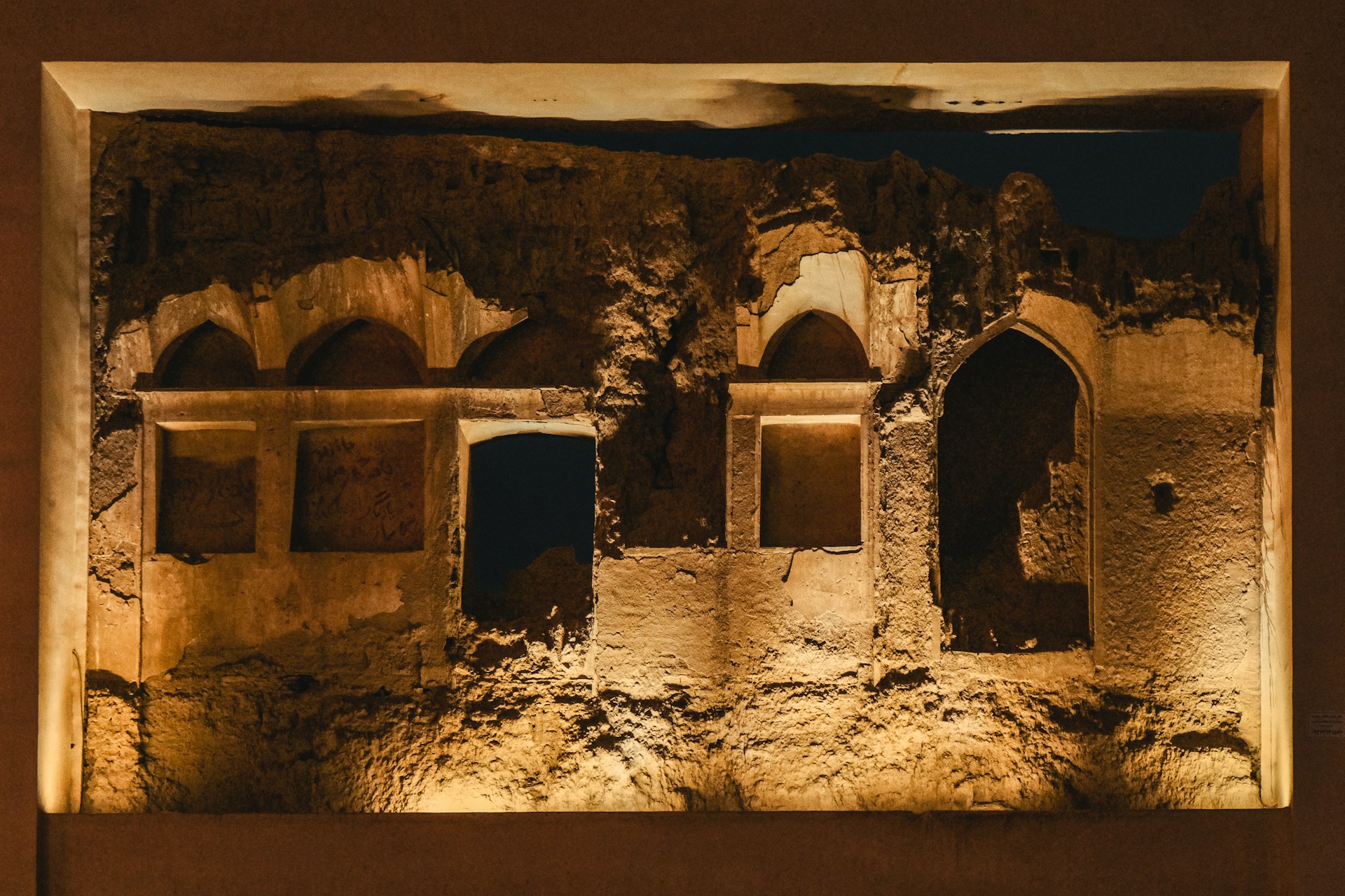 a picture of an old building lit up at night