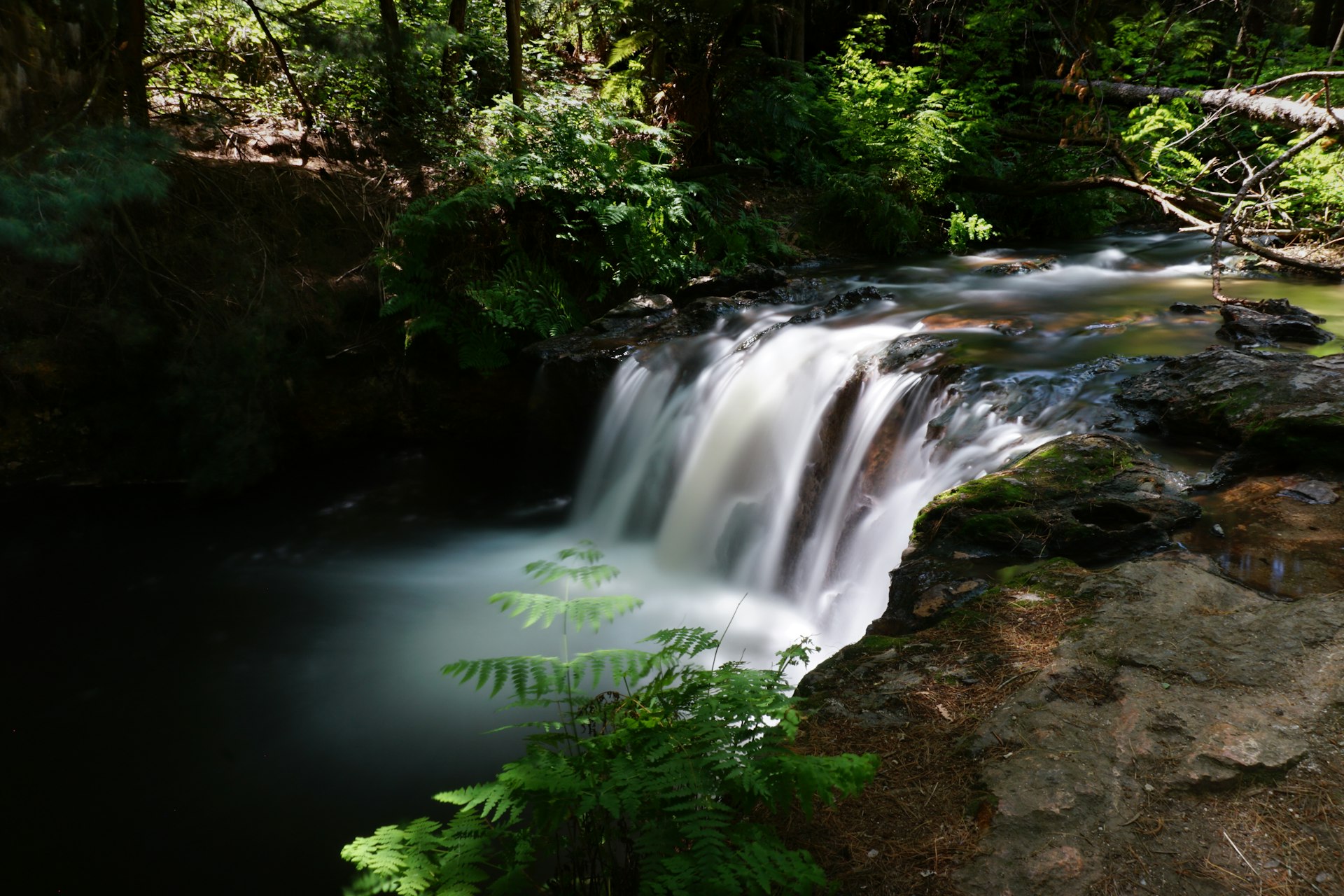 time lapse photography of water falls