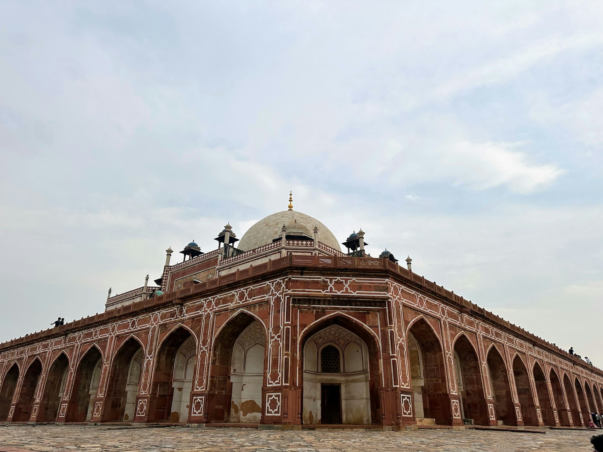 a large brick building with a dome on top of it