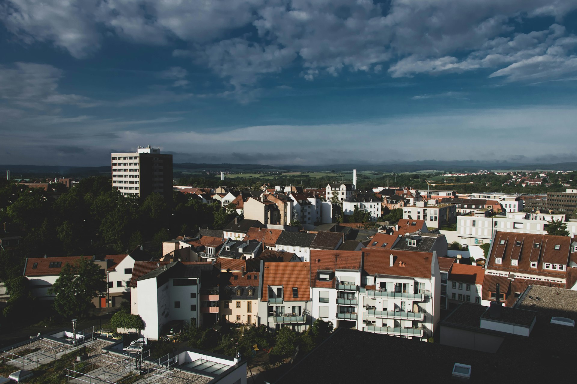 white and brown concrete buildings under blue sky during daytime