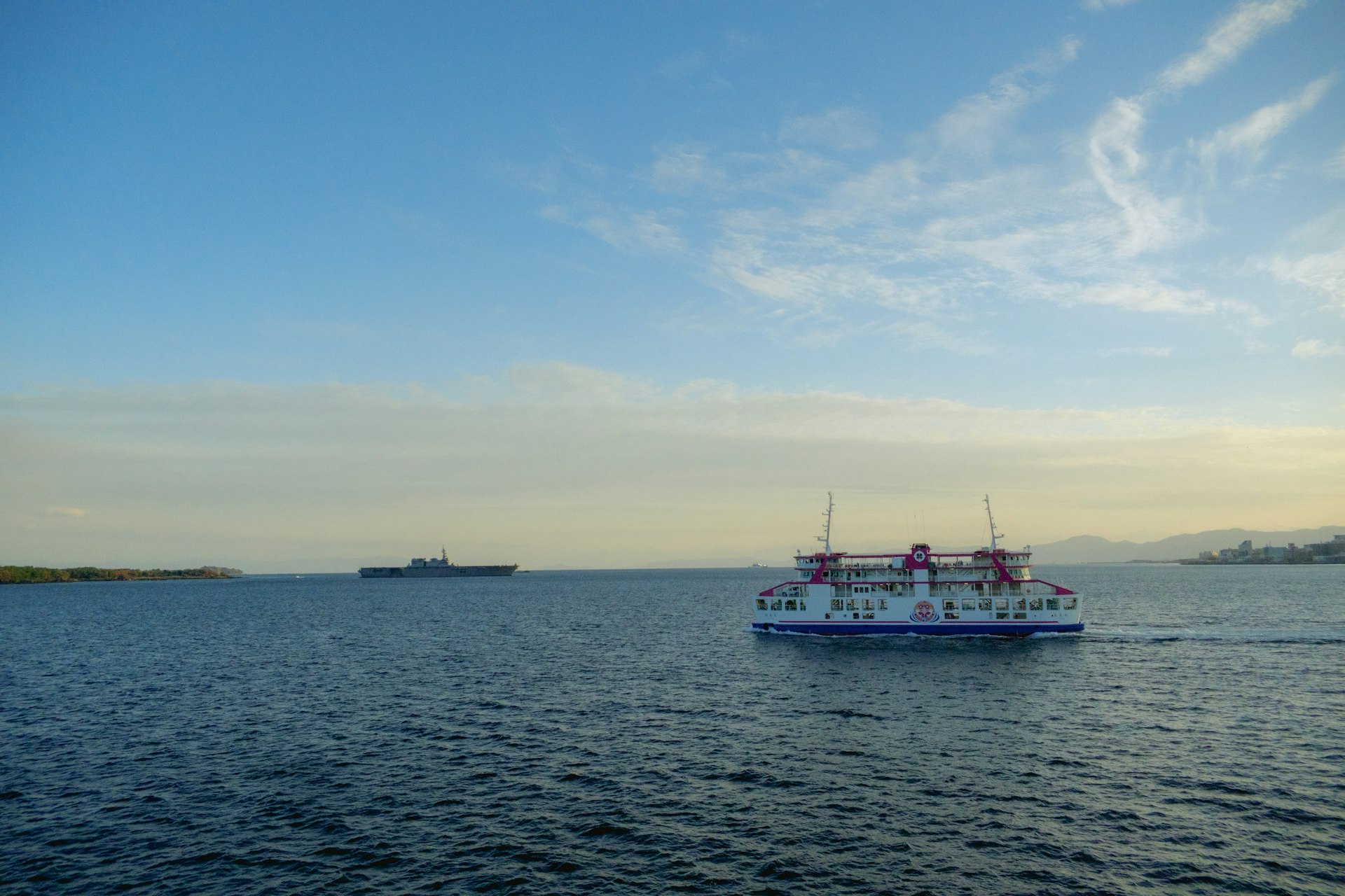 a large boat traveling across a large body of water
