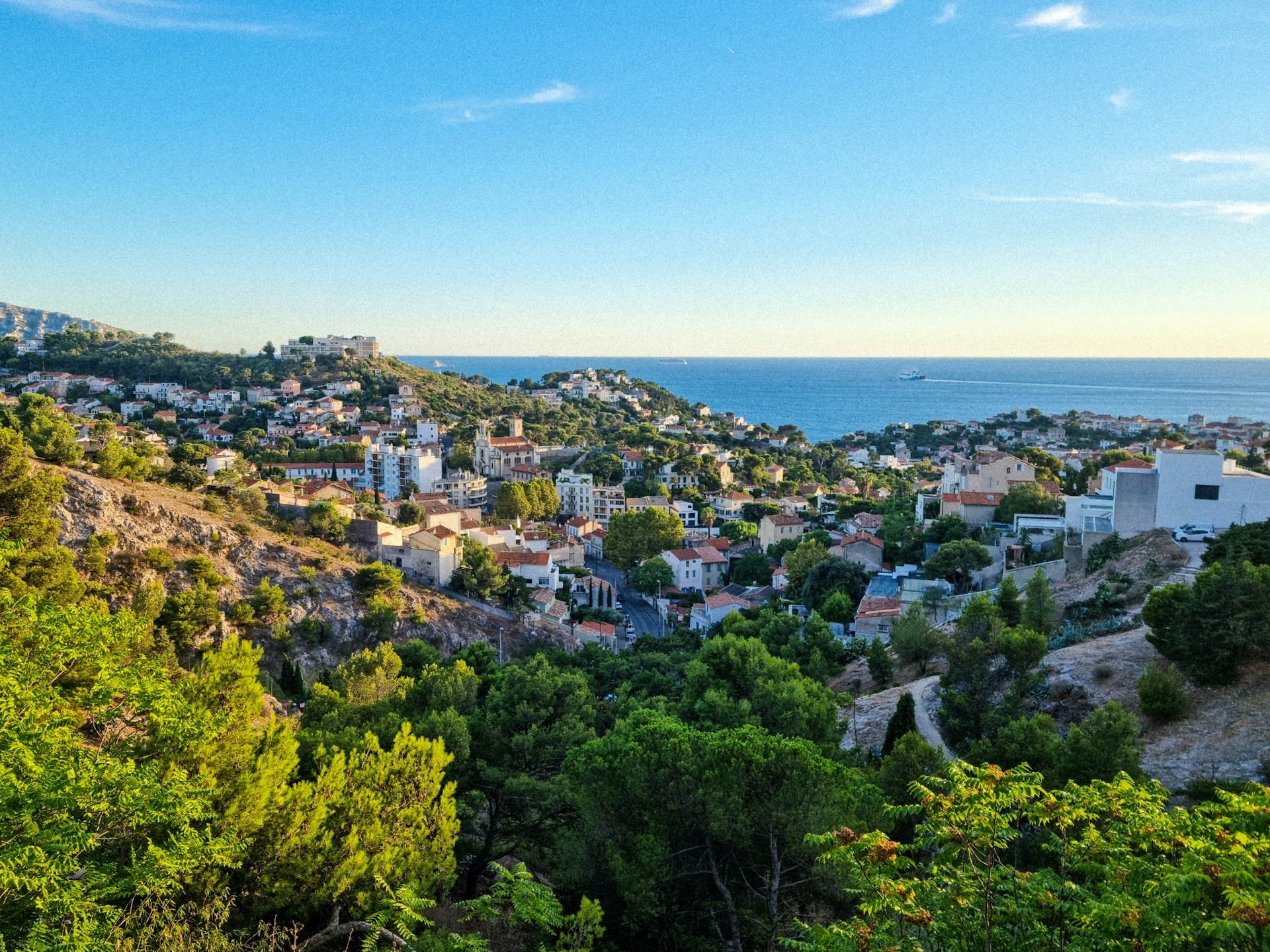 a view of a city from a hill
