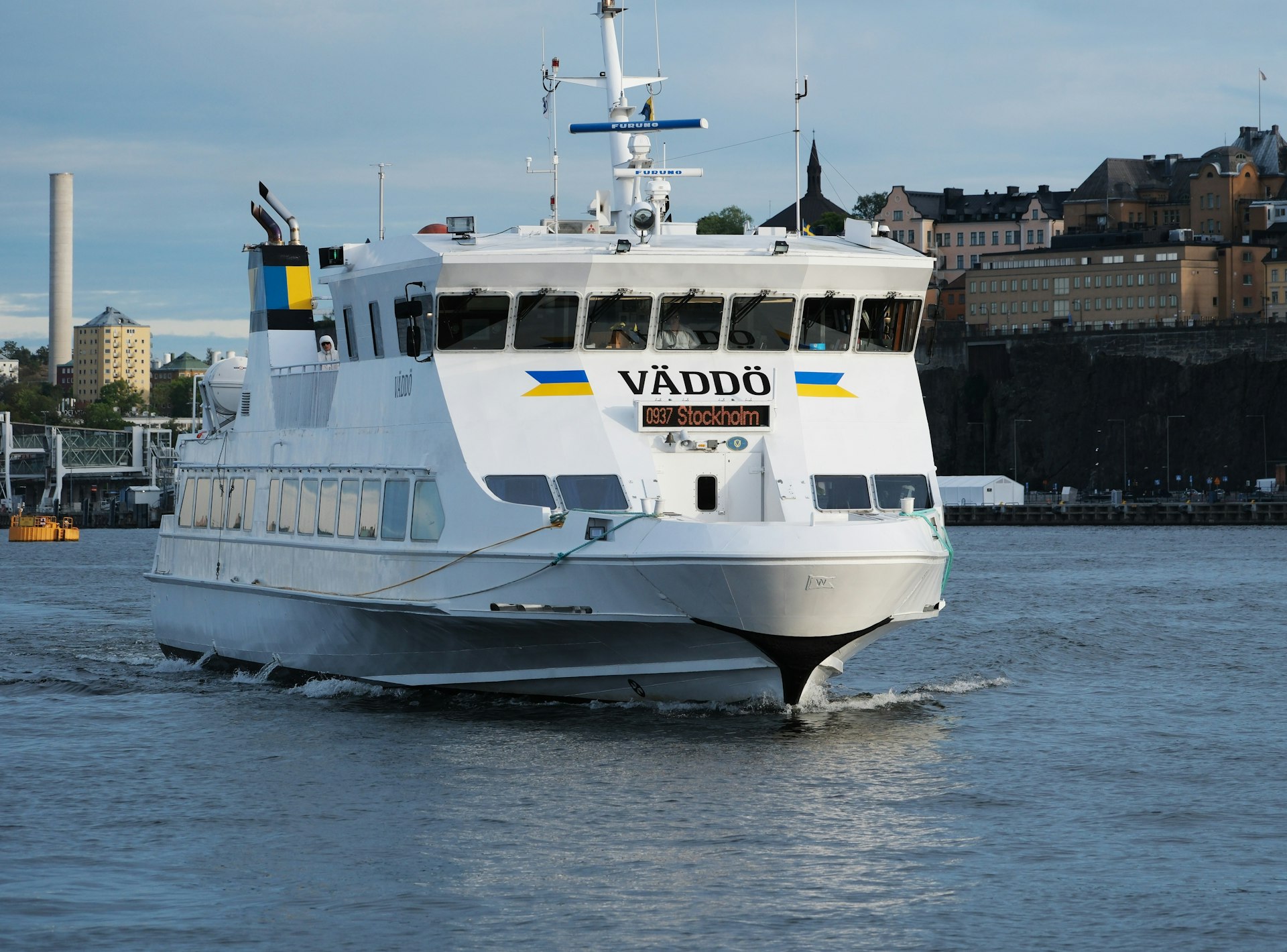 A large white boat in a body of water