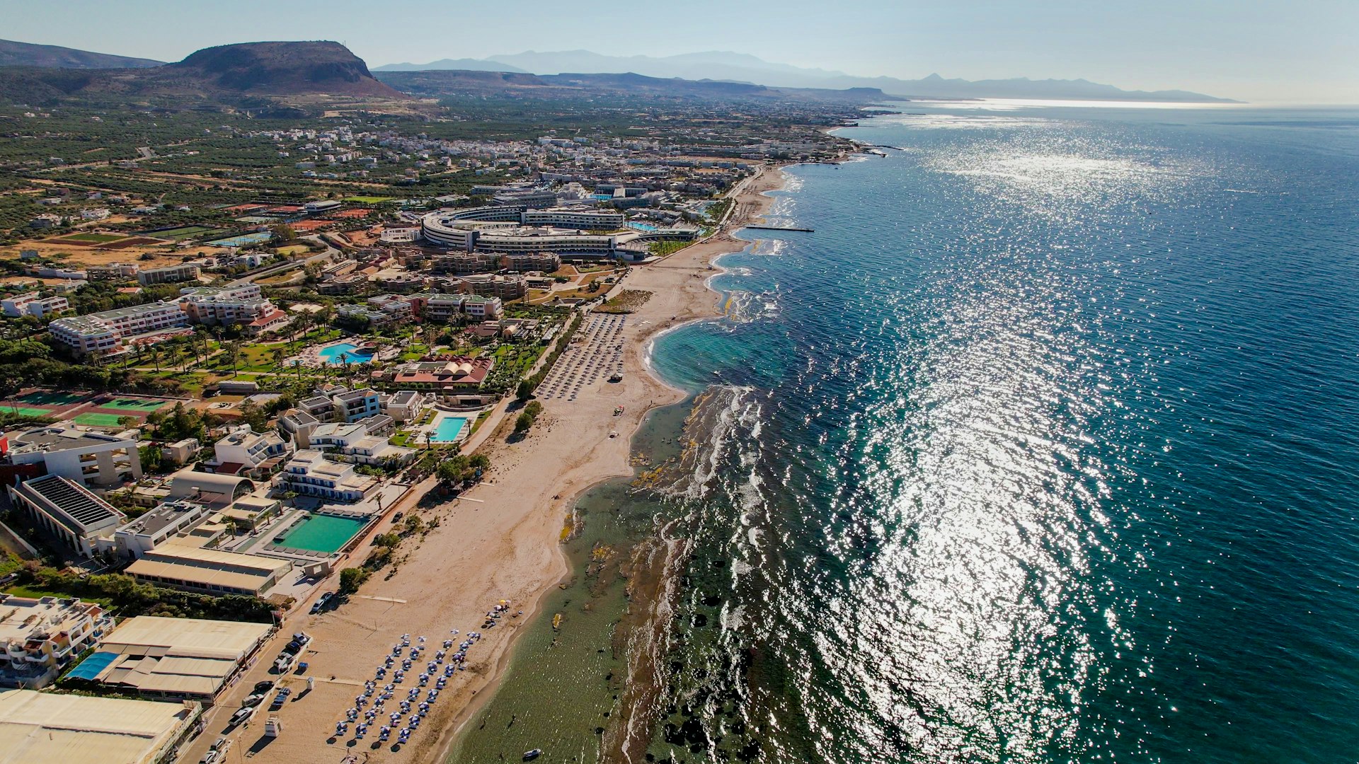 aerial view of city near body of water during daytime