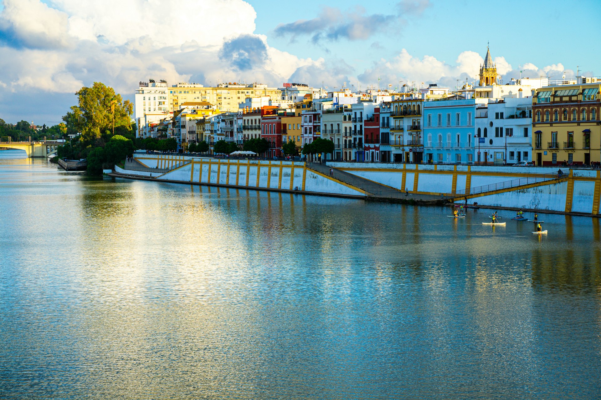 a body of water with buildings in the background