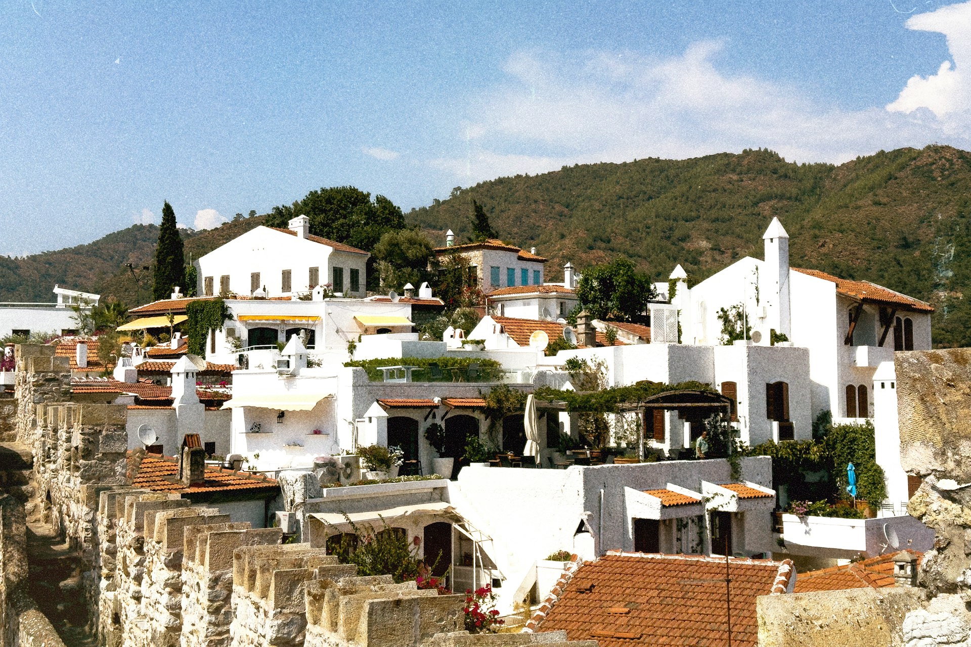 A view of a city with white buildings