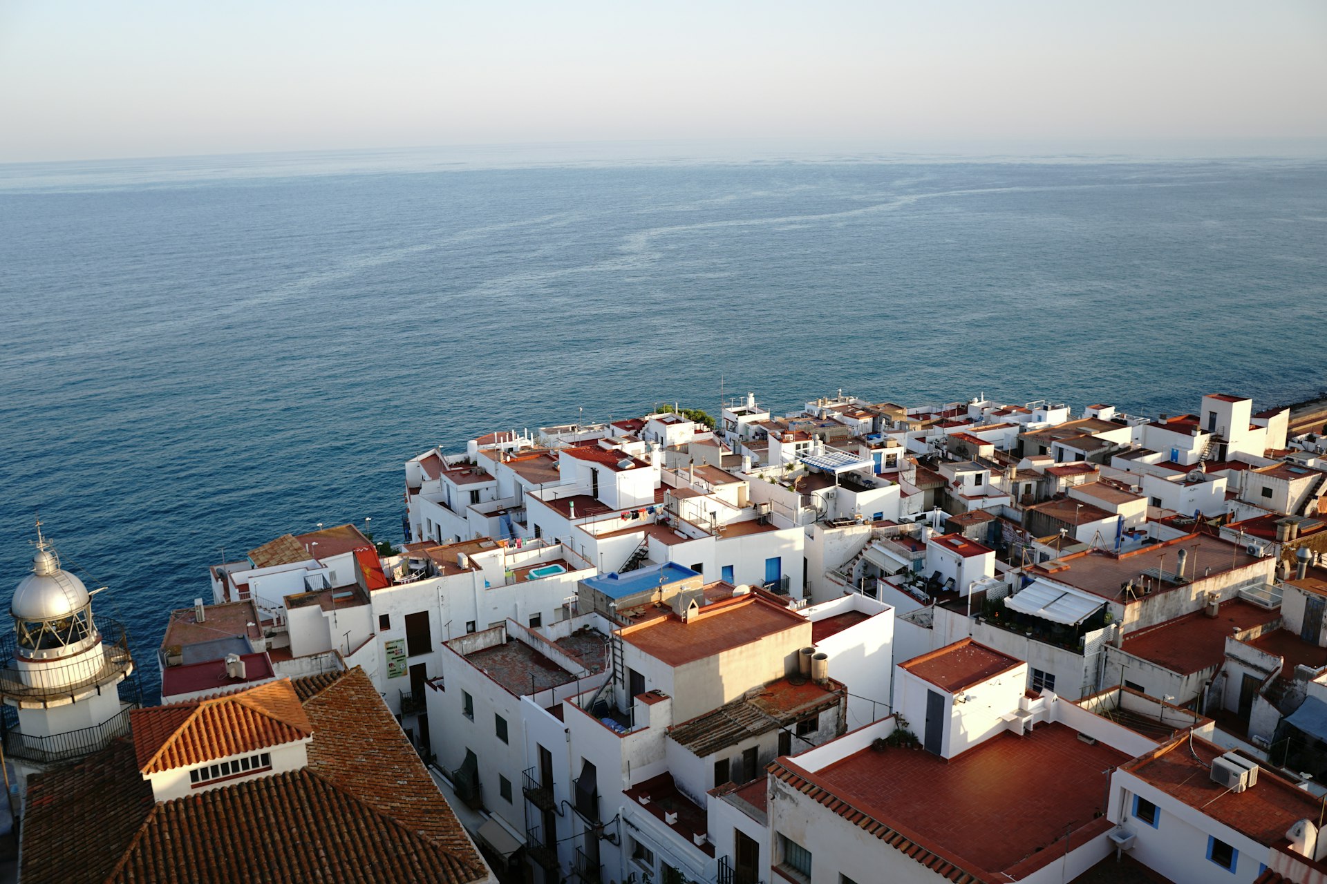 An aerial view of a city by the ocean